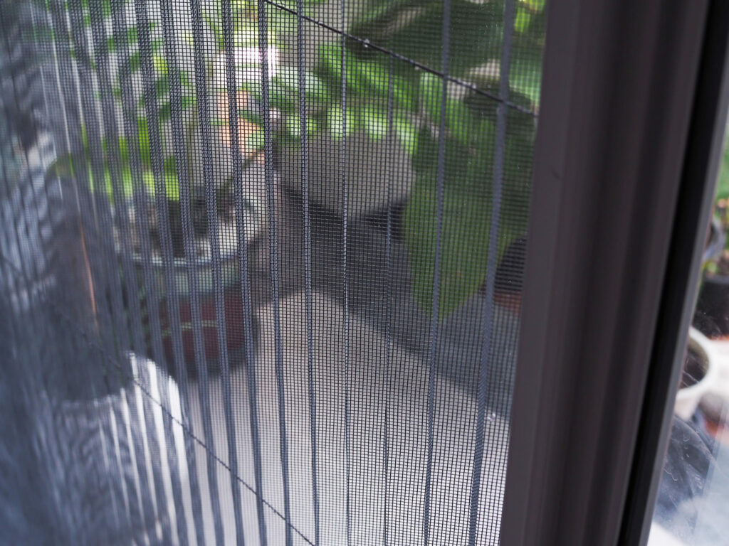 door with mosquito netting screen against wire mosquitoes prevent insects